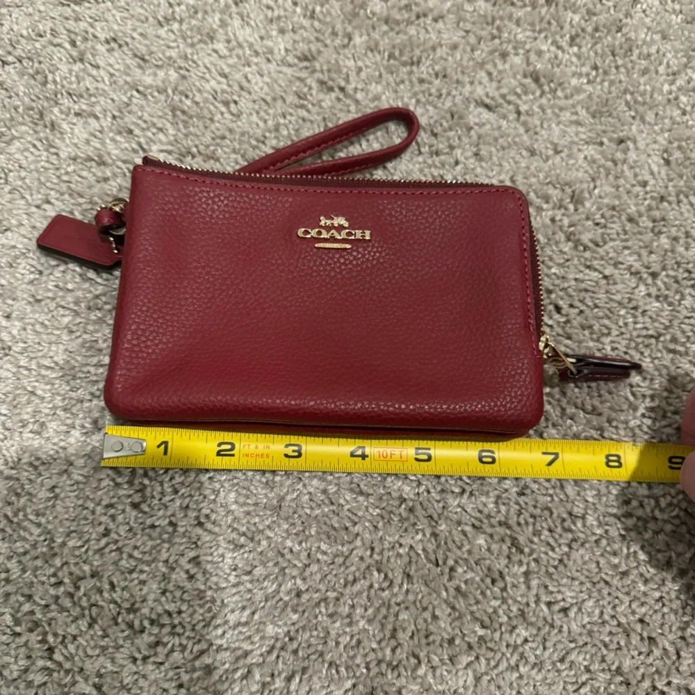 Like 🆕 Coach saturated magenta mini wristlet wallet pouch